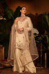 Ivory Raw Silk Kurti Paired With Culottes Pants And Dusty Pink Dupatta