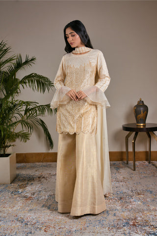 Ivory Tulle Kurti  Paired With Kasab Silk Gharara And Dupatta